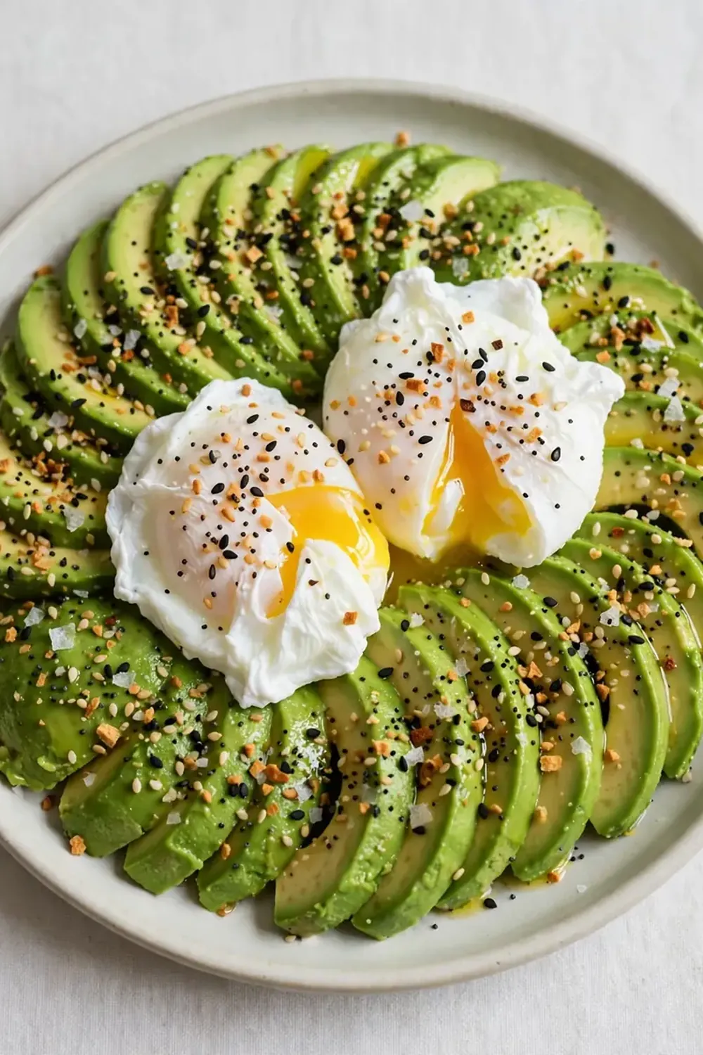 Sliced Avocado with Everything Seasoning and Poached Eggs