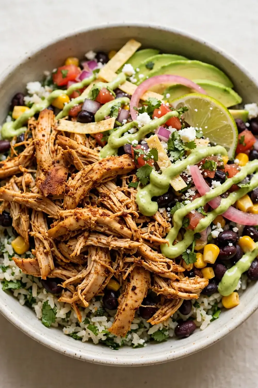 Shredded Mexican Chicken Bowls with Avocado Crema